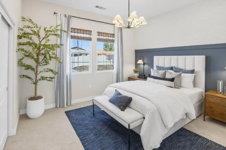 Bedroom styled in light neutrals appealing to many tastes