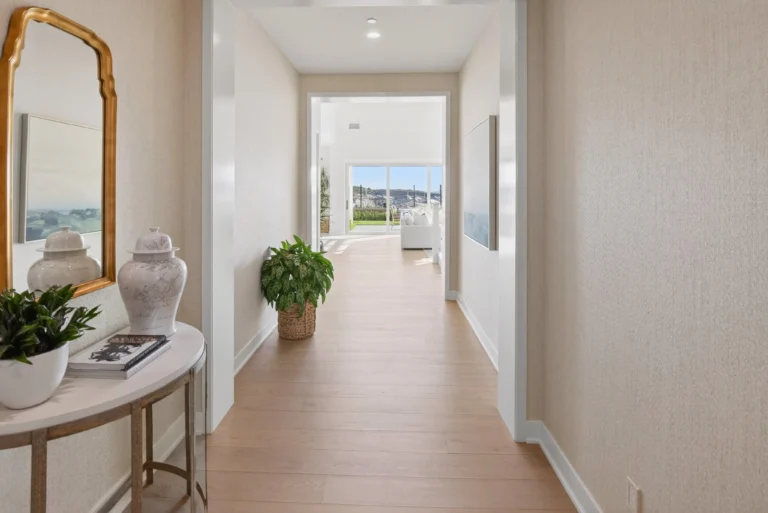 Entryway with a view of the mountains and living room