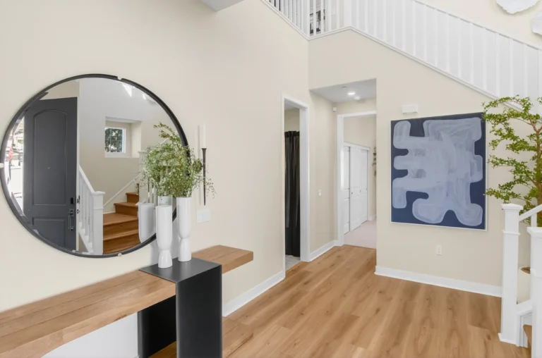 Entryway to stairs and vanity