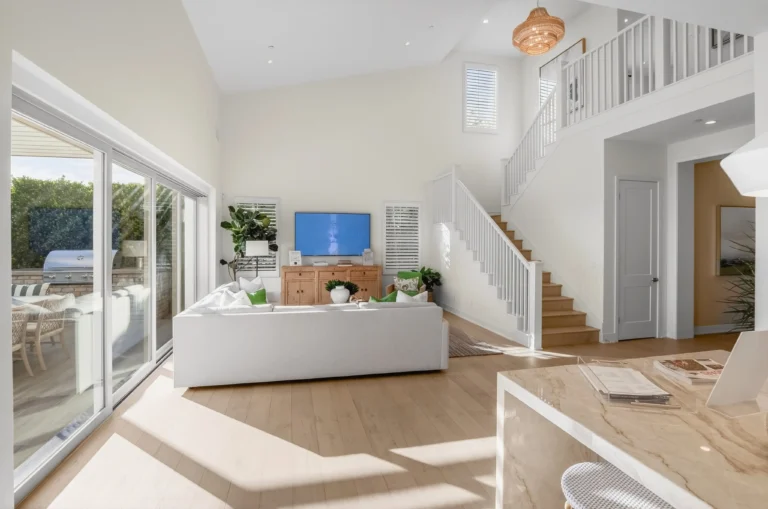 Living room arranged to highlight spacious main gathering zone