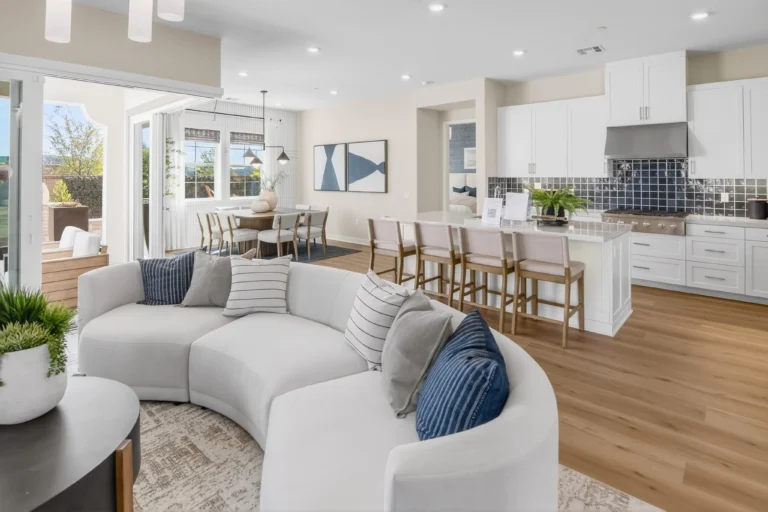 Bright living room with soft textiles and layered decorative accents