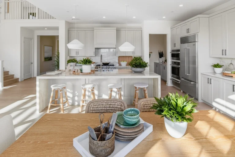 Kitchen designed with modern flat front cabinets and quartz surfaces