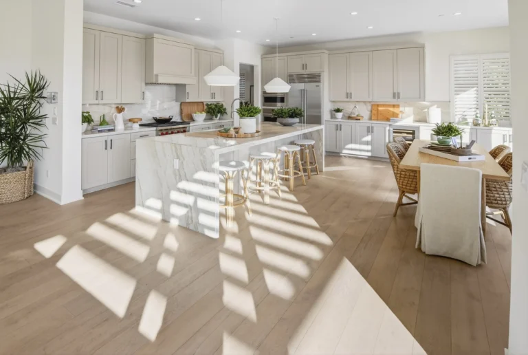 Kitchen showcased from corner angle to capture full layout