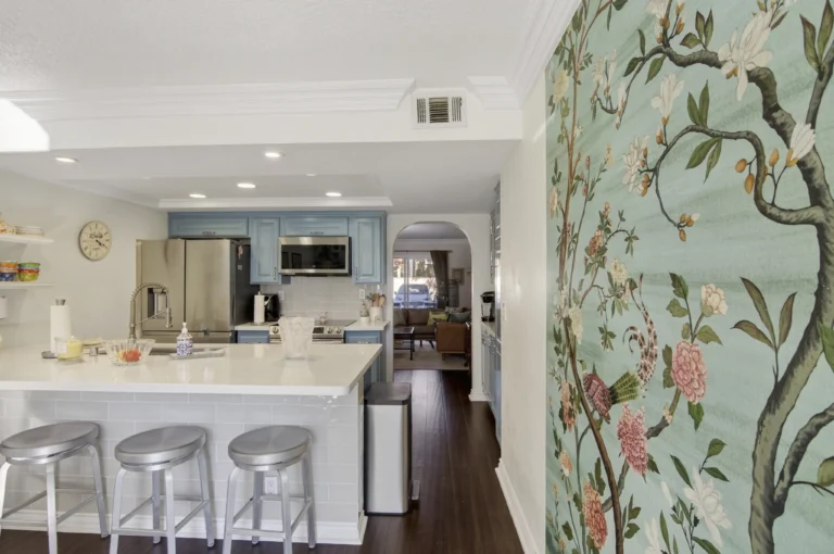 Compact kitchen efficiently laid out with updated appliances