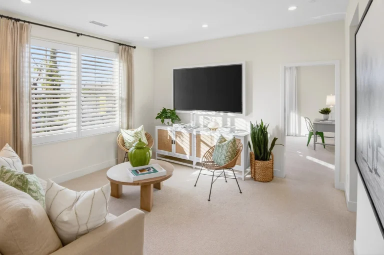 Media room with large screen, recliners and dim lighting