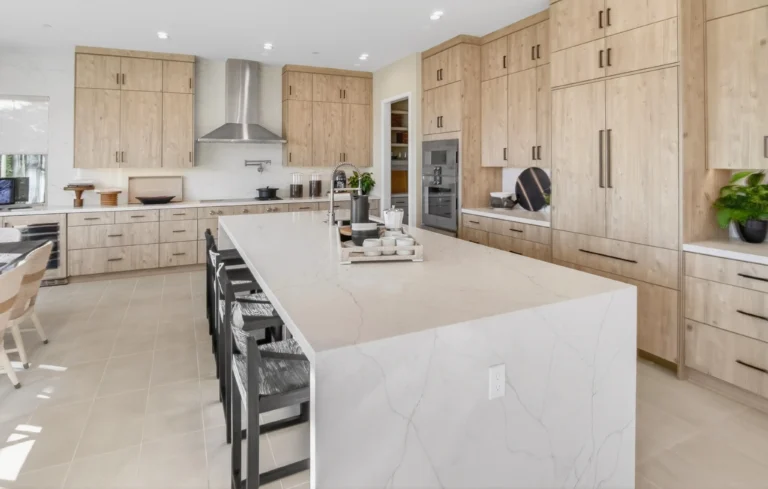 Updated luxury kitchen with recessed lighting and luxury vinyl flooring