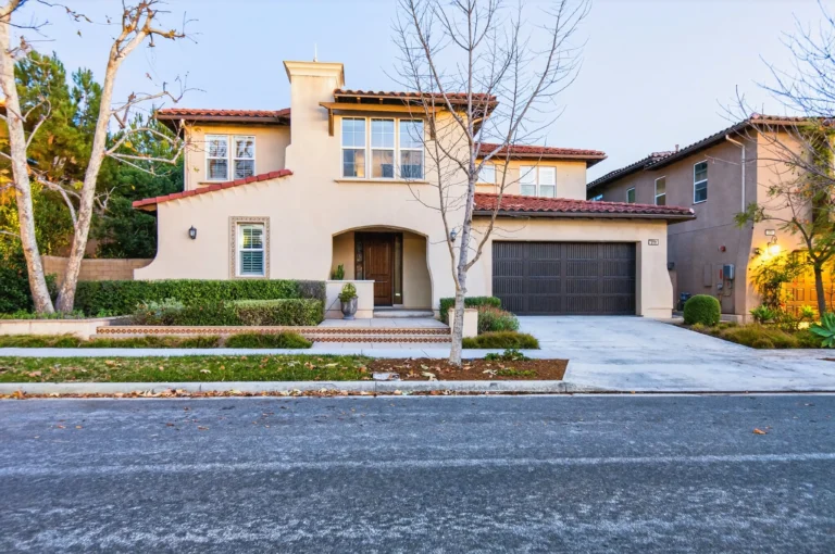 Modern home exterior featuring clean lines, large windows and stucco